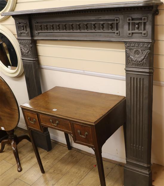 A 19th century cast iron fire surround W.150cm